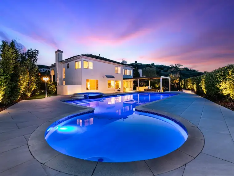 Pool and lounge paver project near Northridge by Mi Casa Exteriors