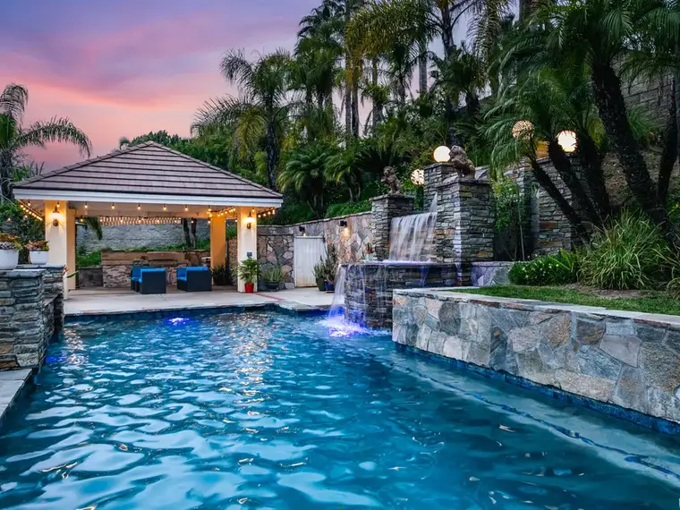 Pool and paver deck project near Northridge by Mi Casa Exteriors