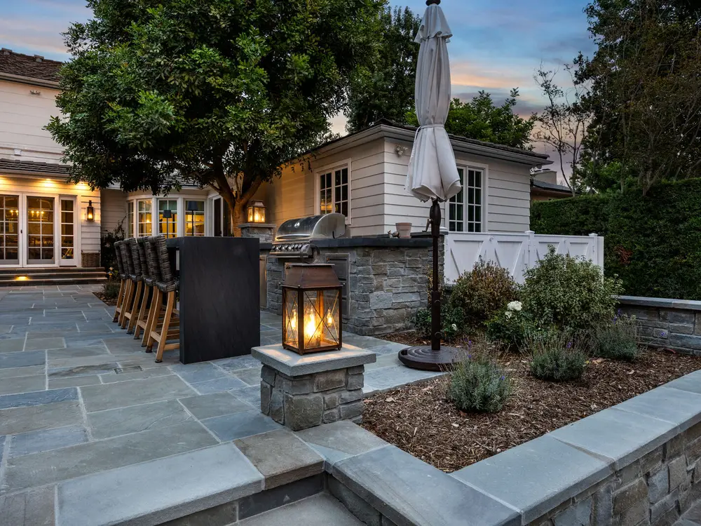 Custom outdoor kitchen and BBQ island built by Mi Casa Exteriors
