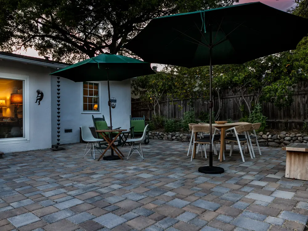 Paver patio with seating area built by Mi Casa Exteriors